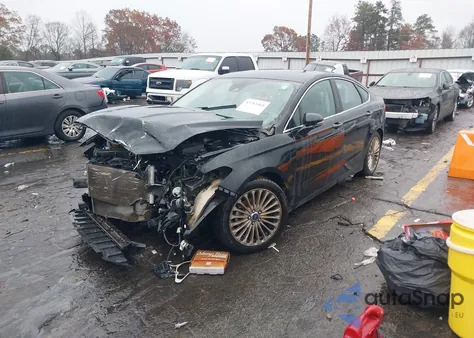 2014 Ford Fusion Titanium z USA, uszkodzony, nr VIN 3FA6P0K9XER349634